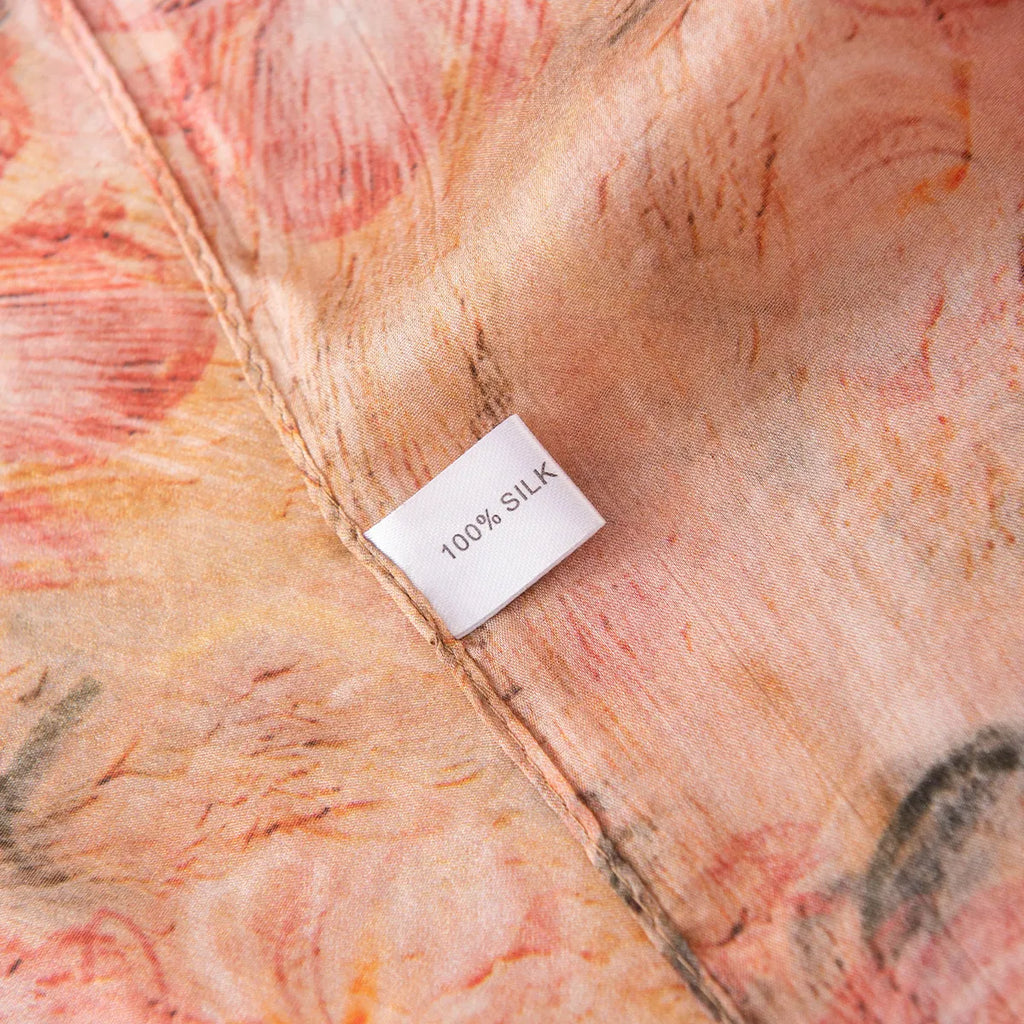 100% silk label on blush floral scarf