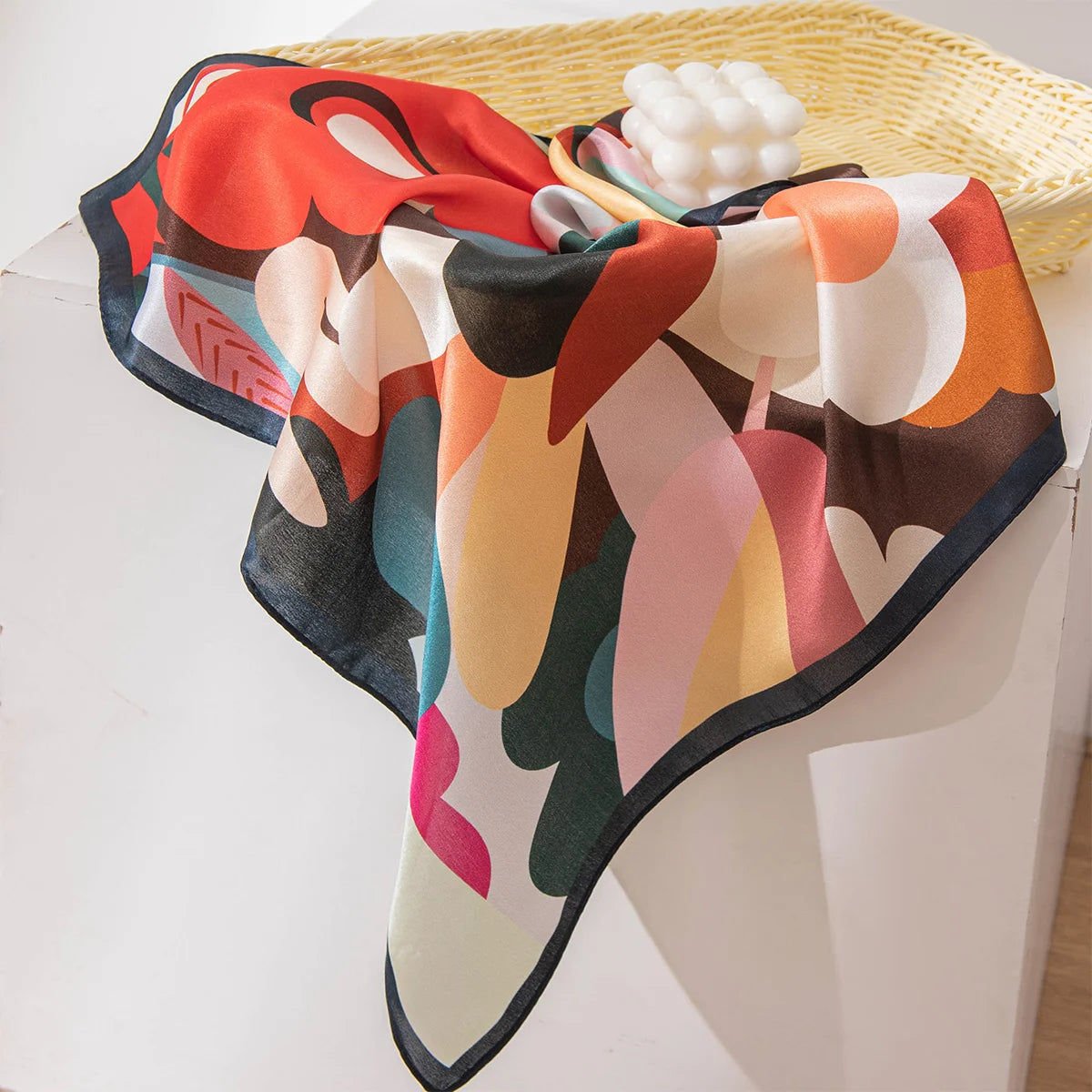 Abstract floral Silk Square Scarf draped on display