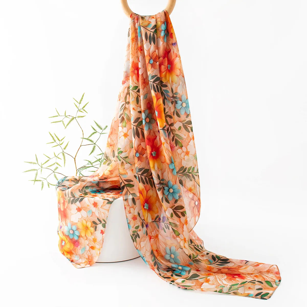 Apricot wildflower silk scarf hanging display
