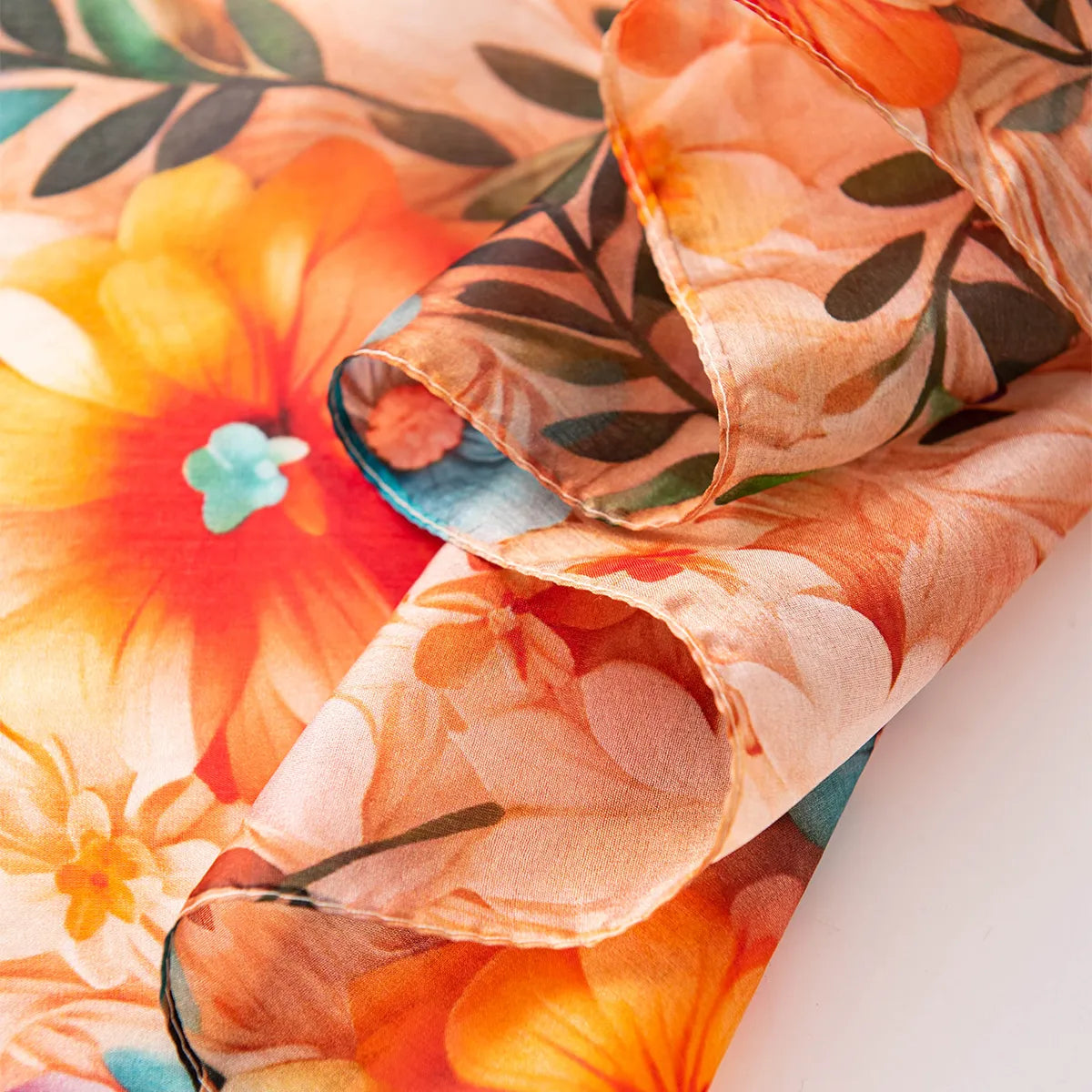 Apricot wildflower silk scarf hem detail
