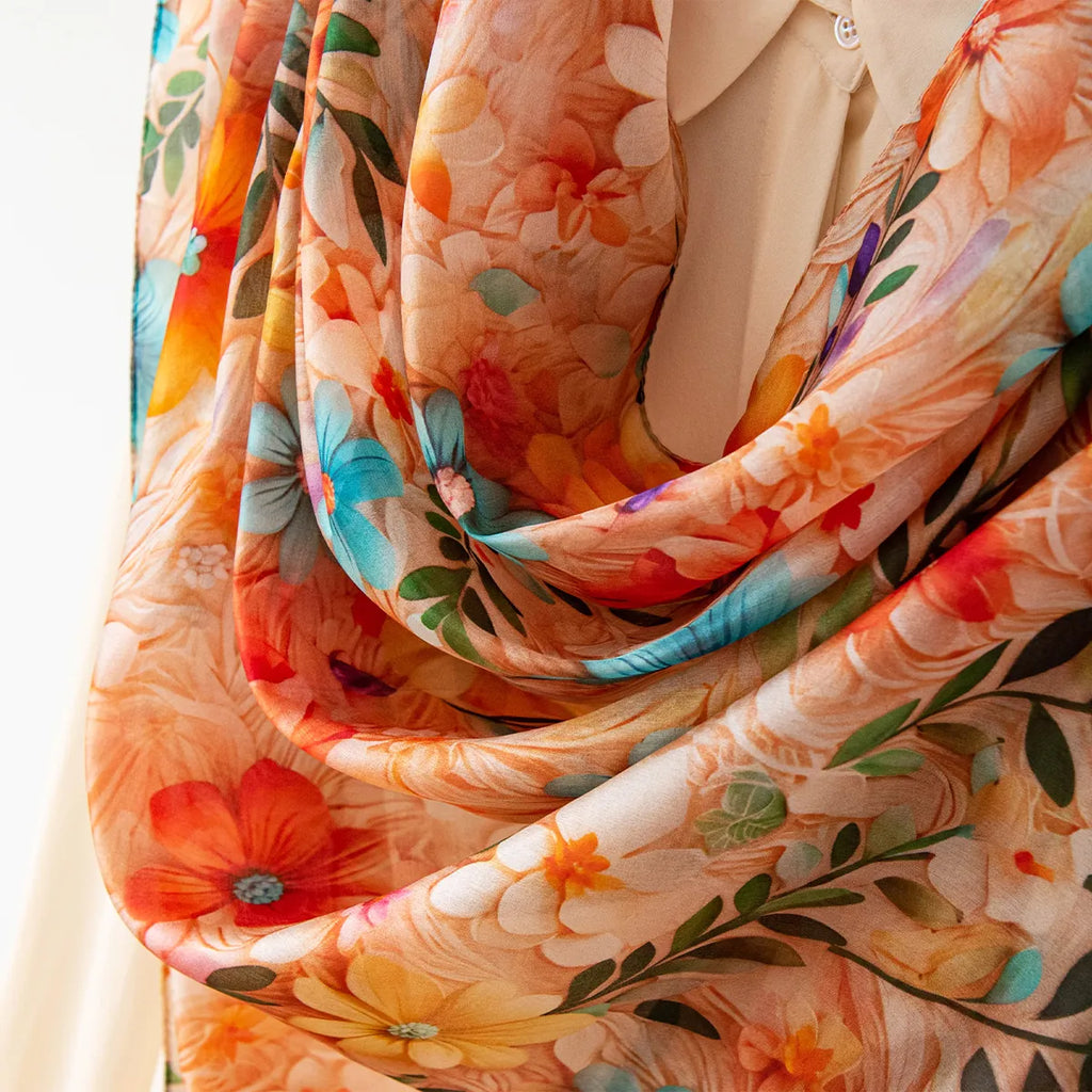 Apricot wildflower silk shawl draped on blouse