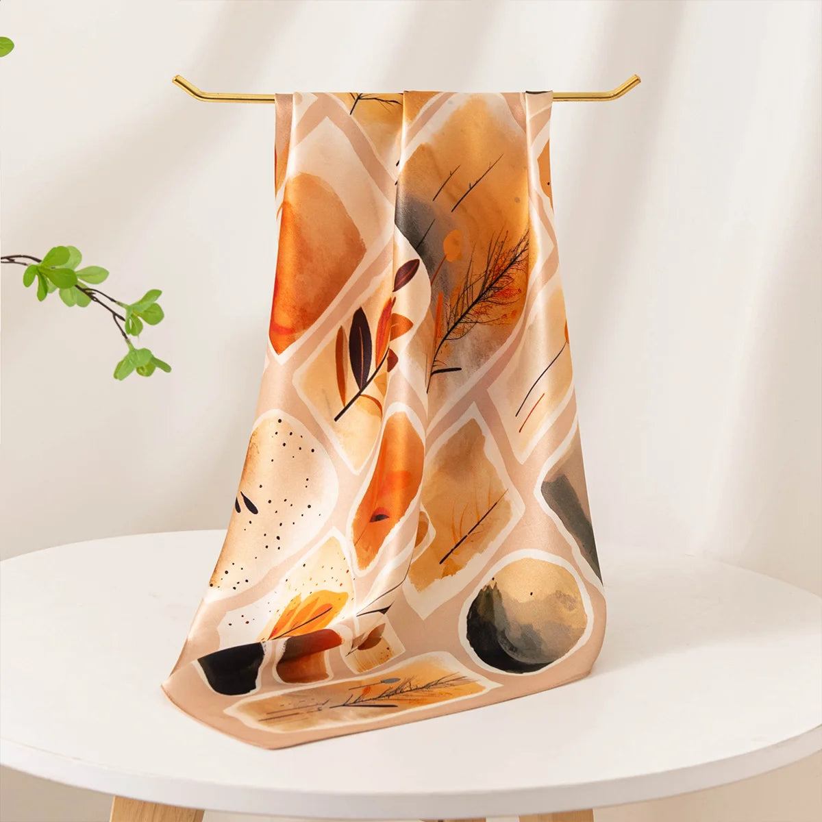 Autumn print Silk Square Scarf draped on display
