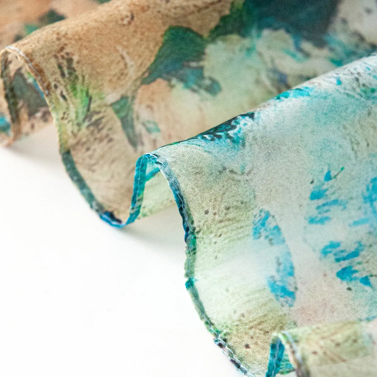 Azure seascape silk scarf hem detail