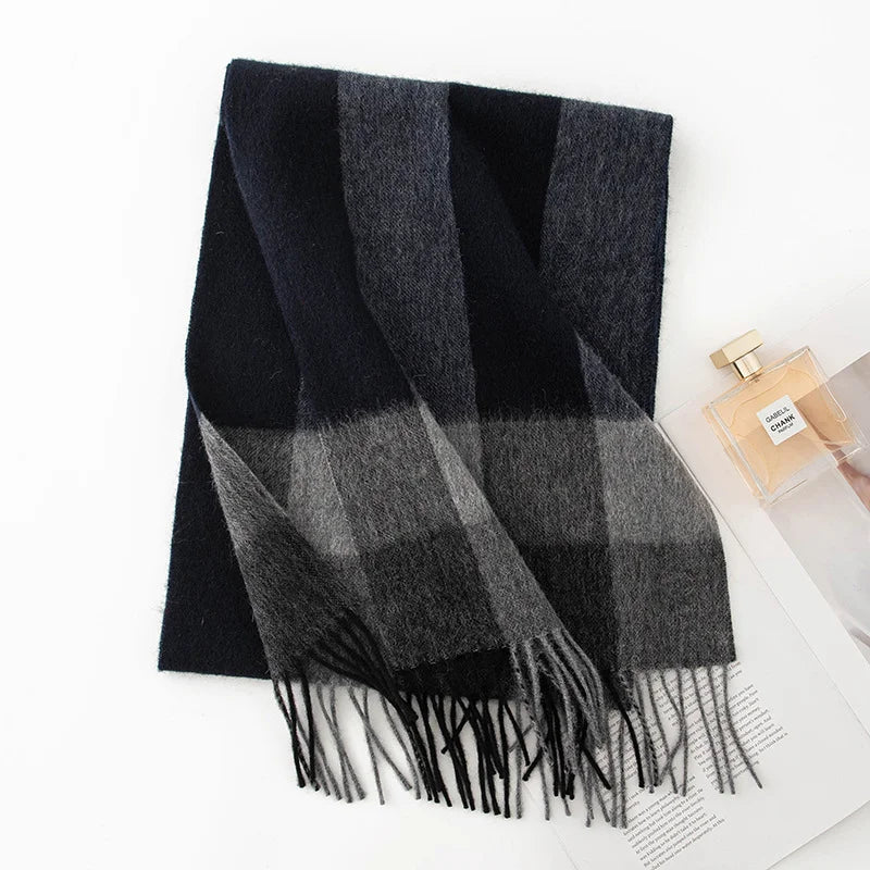 Black and gray striped wool scarf showing contrasting fringed ends