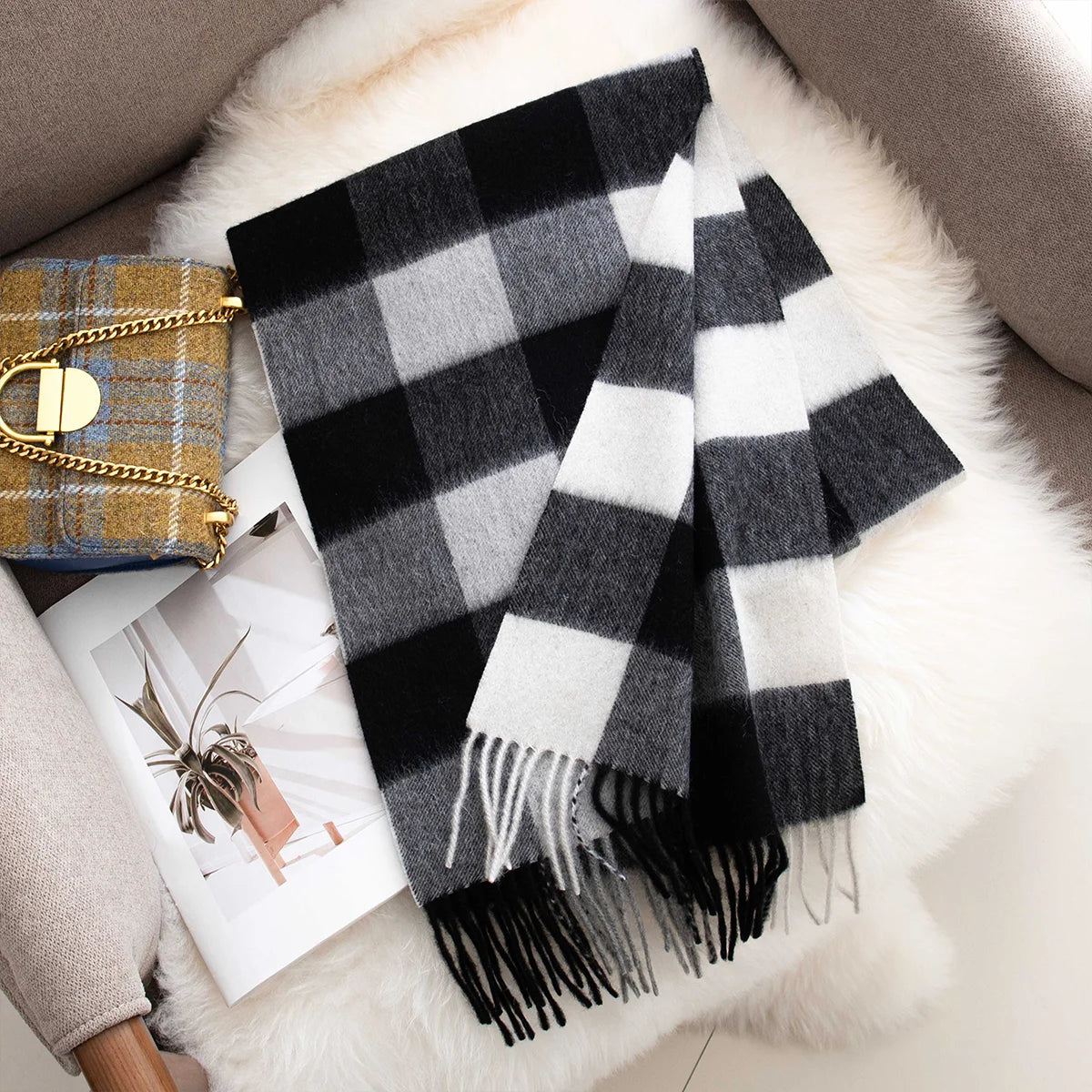 Black white buffalo check wool scarf showing long contrasting fringe