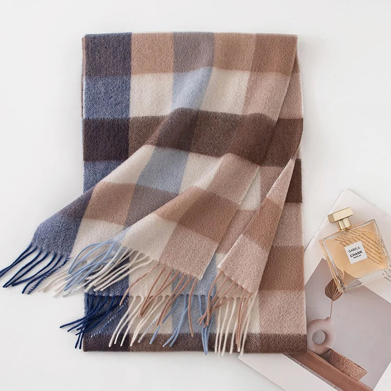 Blue brown cream small check cashmere scarf beside perfume bottle