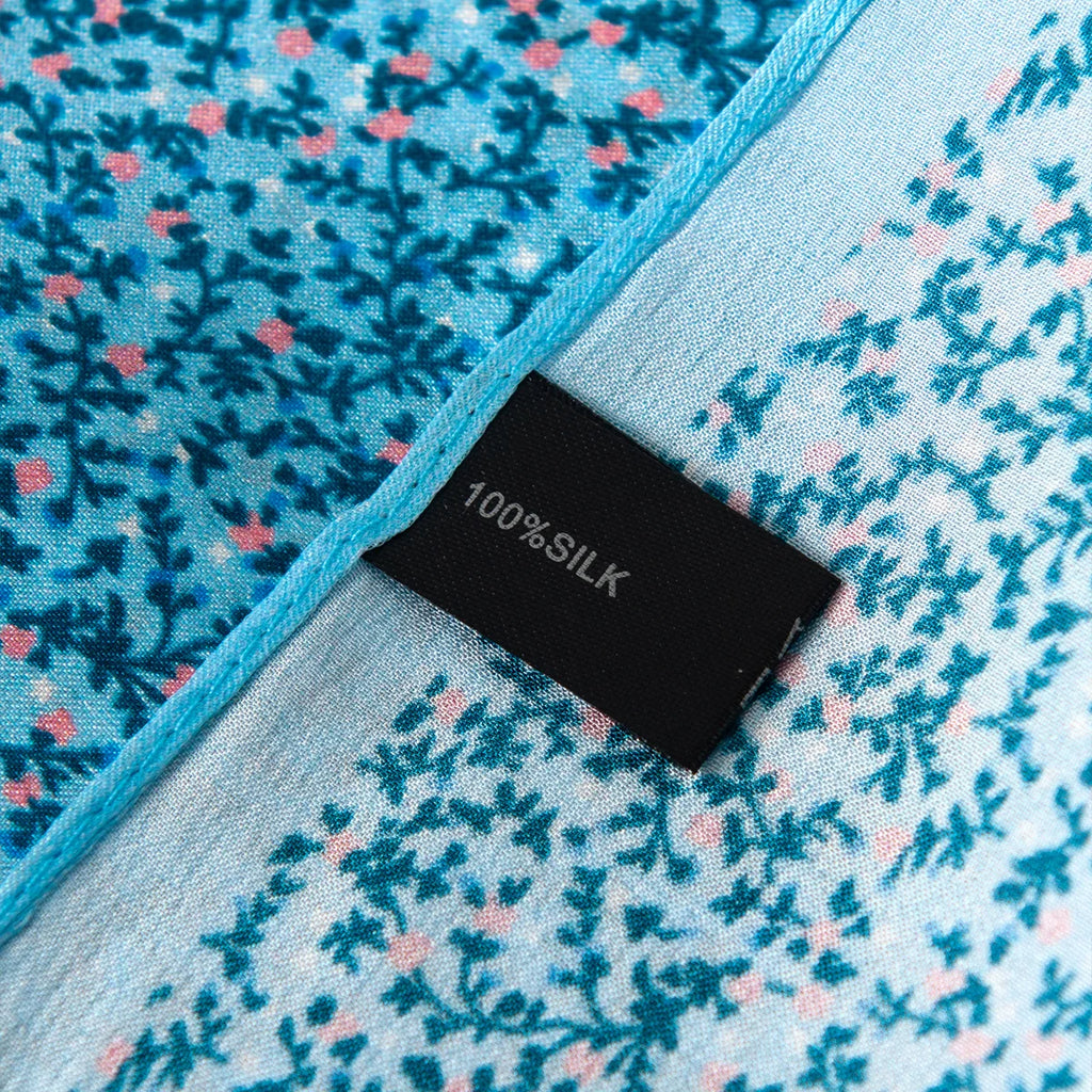 Blue ditsy floral silk scarf label detail