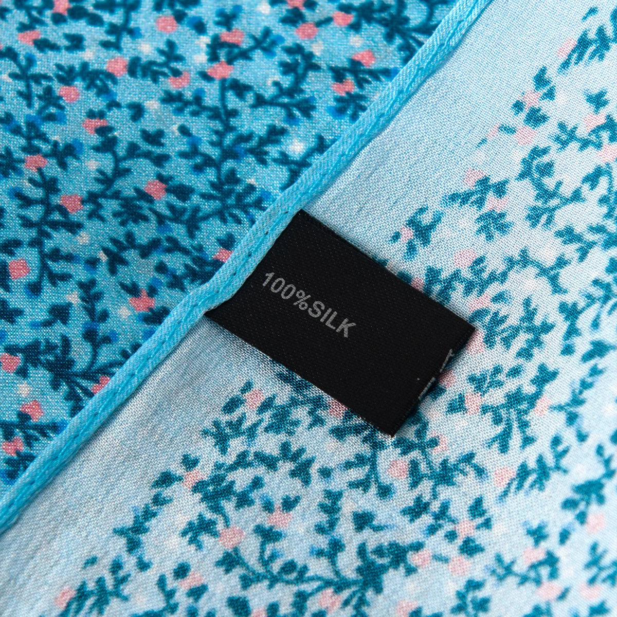 Blue ditsy floral silk scarf label detail