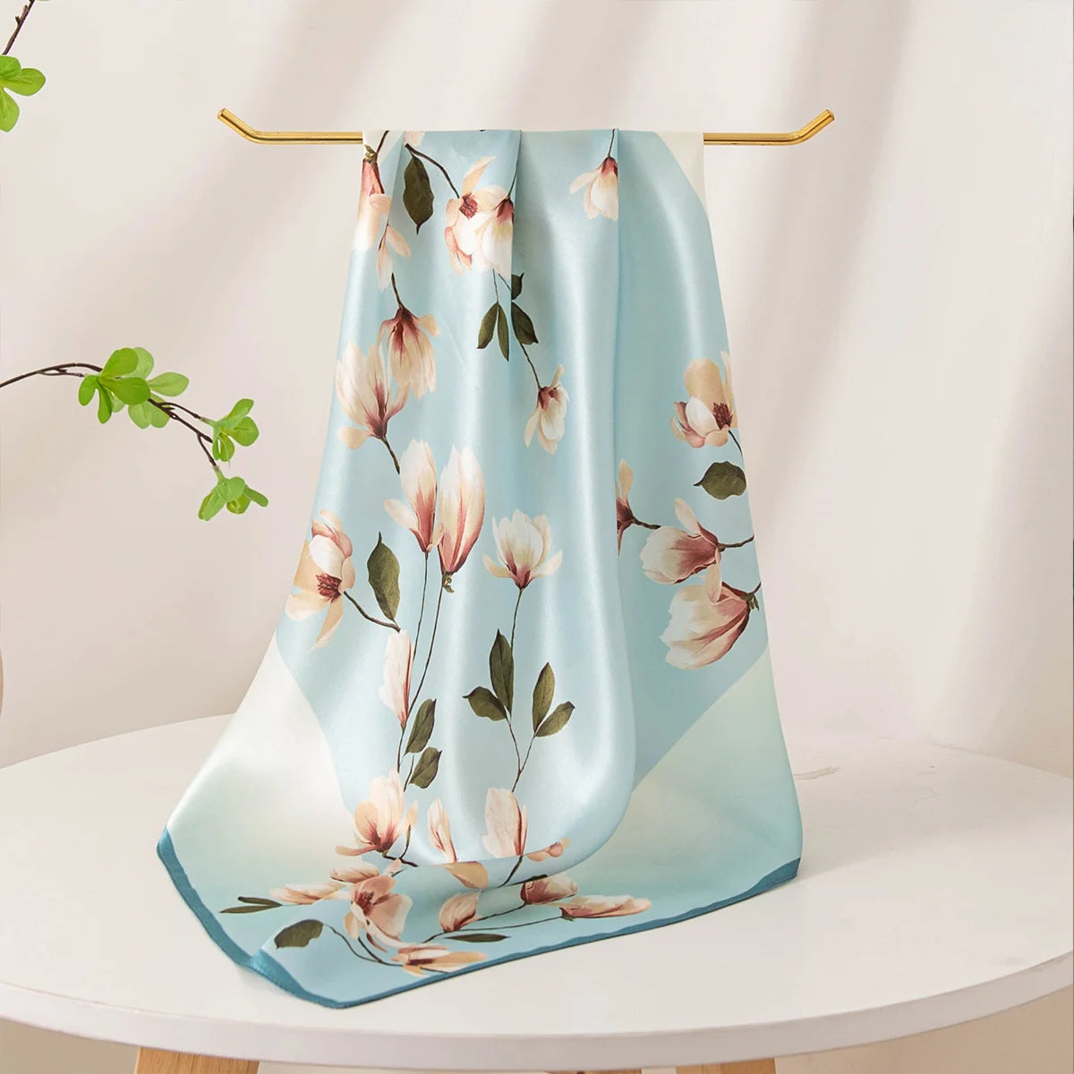 Blue floral Silk Square Scarf draped on display