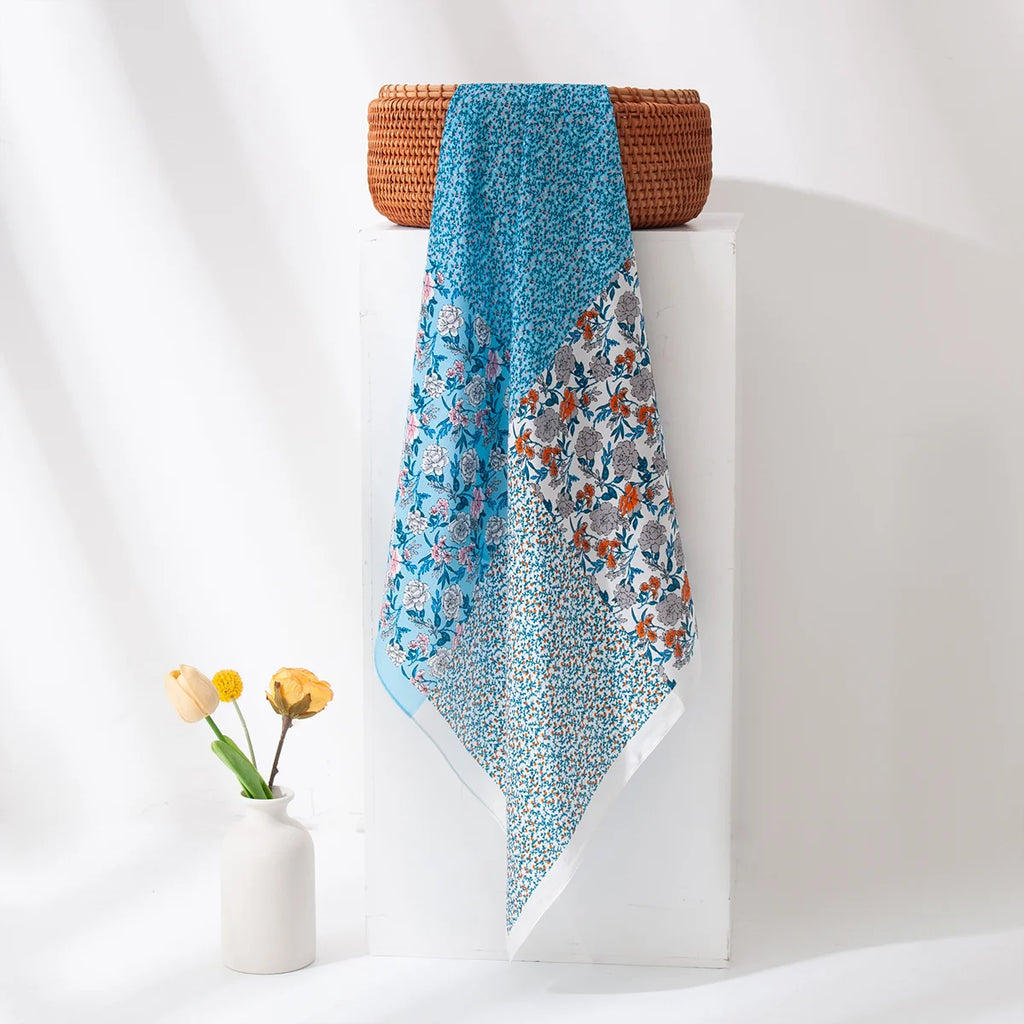 Blue patchwork floral silk scarf hanging display