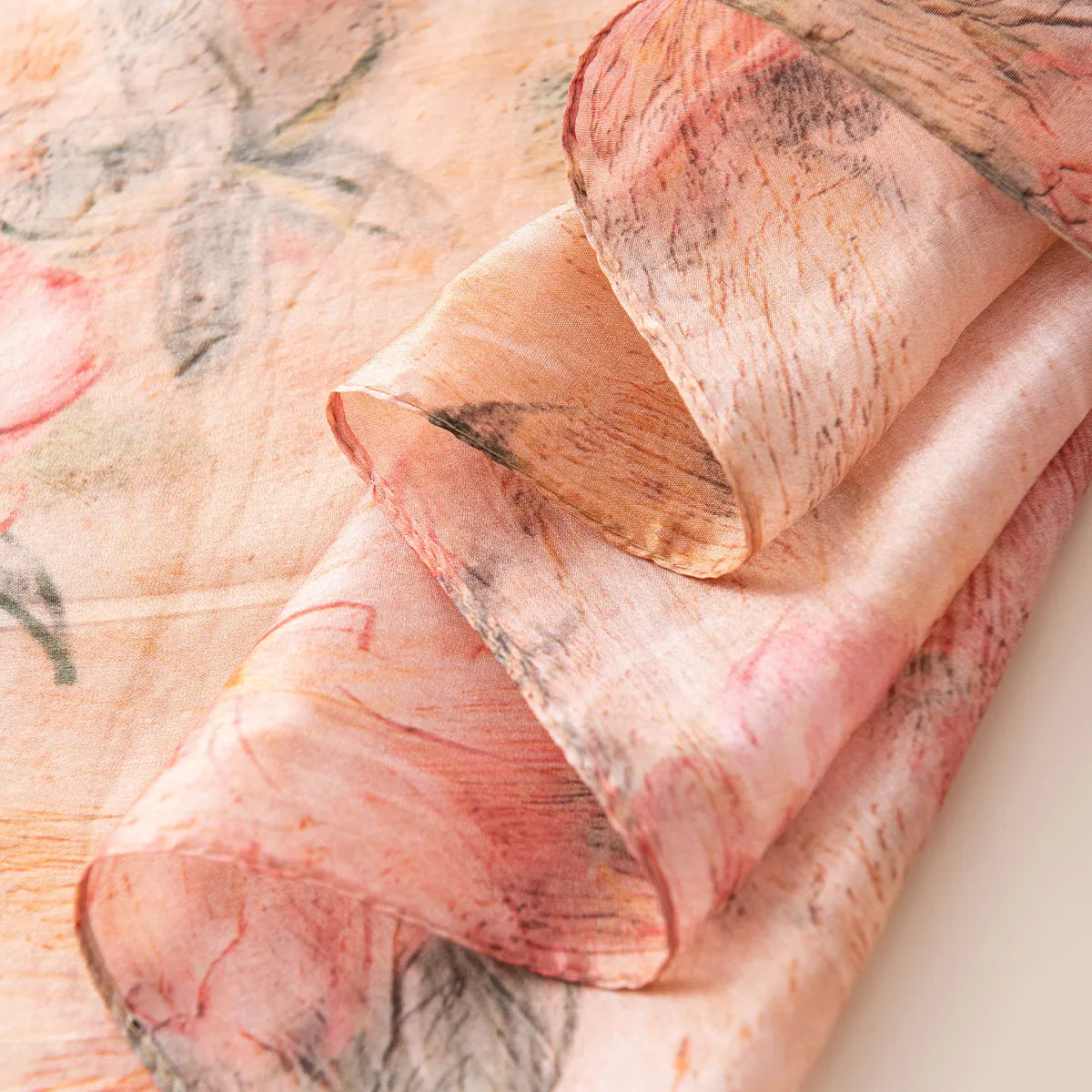 Blush cherry blossom silk scarf hem detail