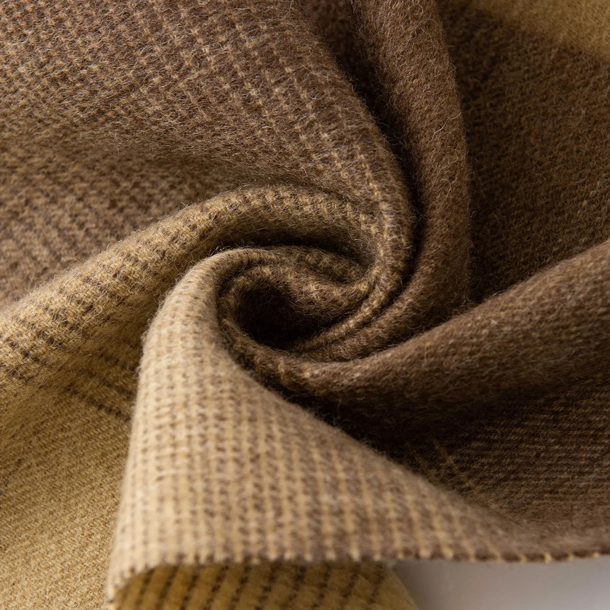 Brown mustard checked fabric gathered into a central swirl