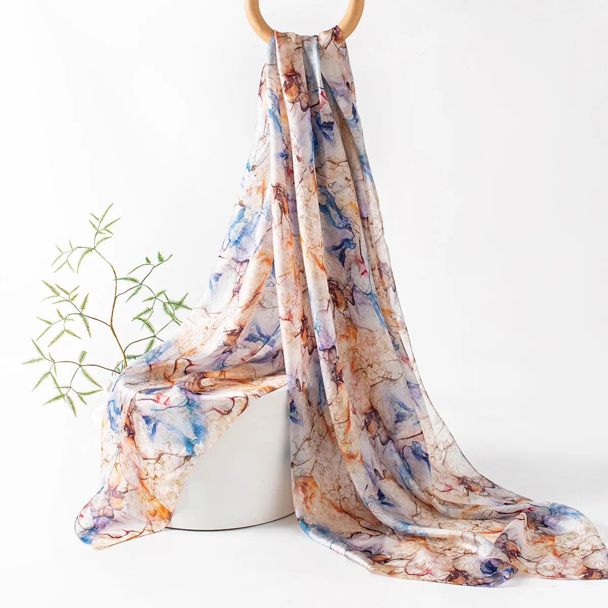 Cobalt and amber silk scarf hanging display