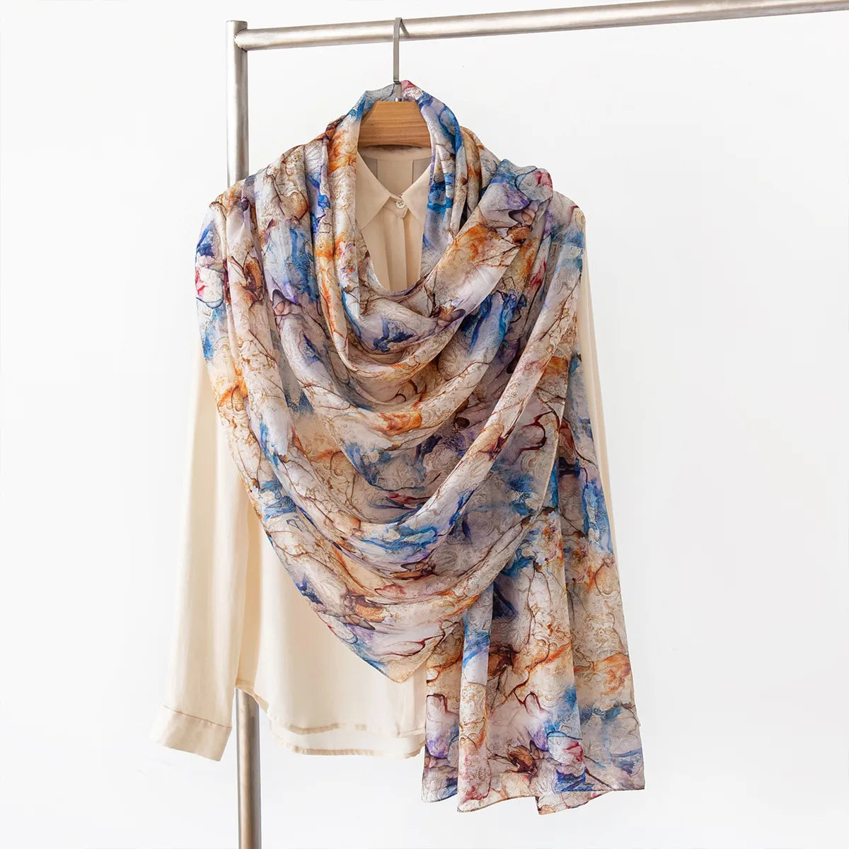 Cobalt and amber silk shawl on blouse