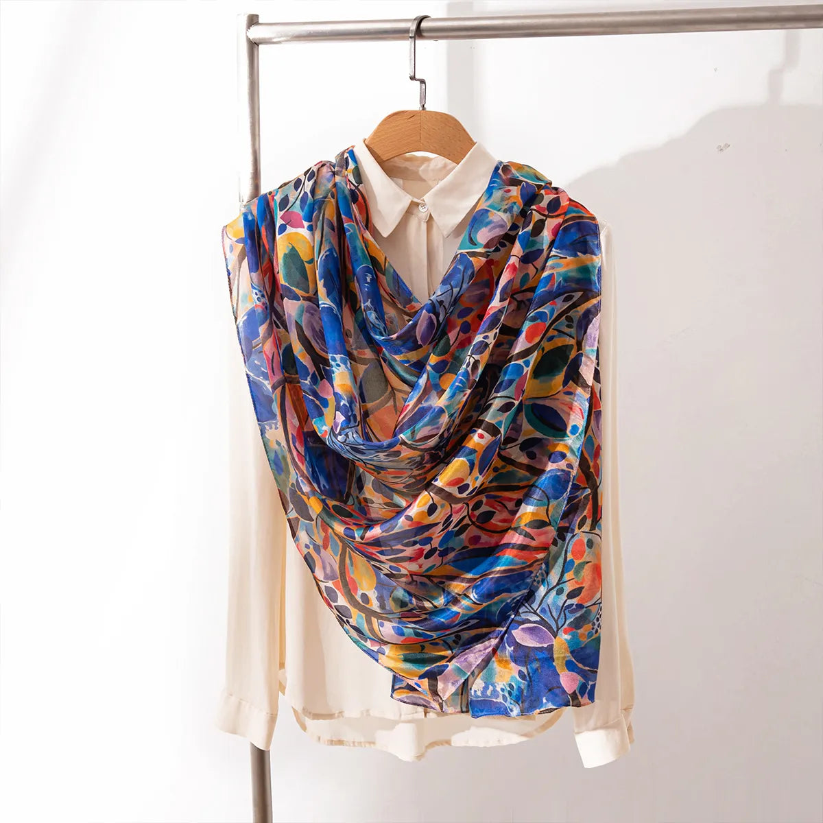 Cobalt and tangerine silk shawl on blouse