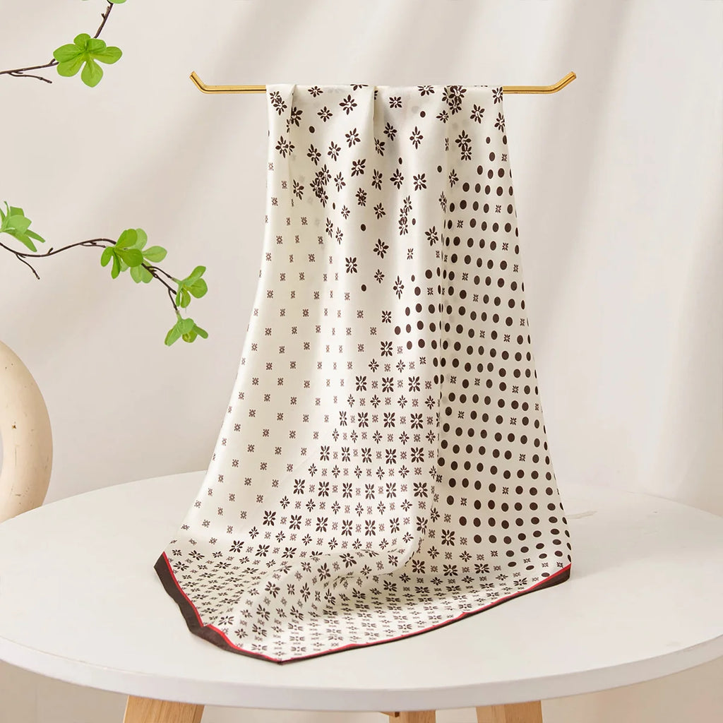 Cream Silk Square Scarf draped over display table