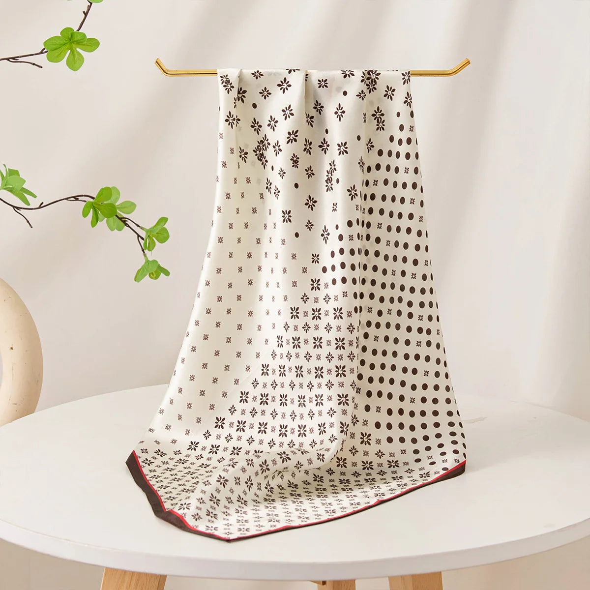 Cream Silk Square Scarf draped over display table