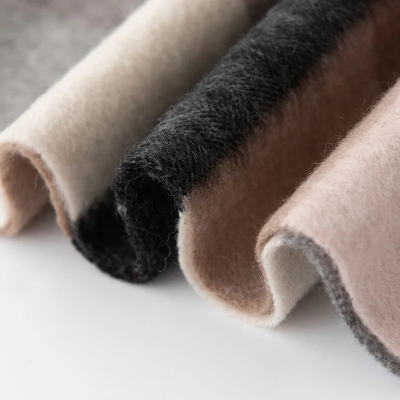 Cream black and taupe folds highlighting the brushed surface