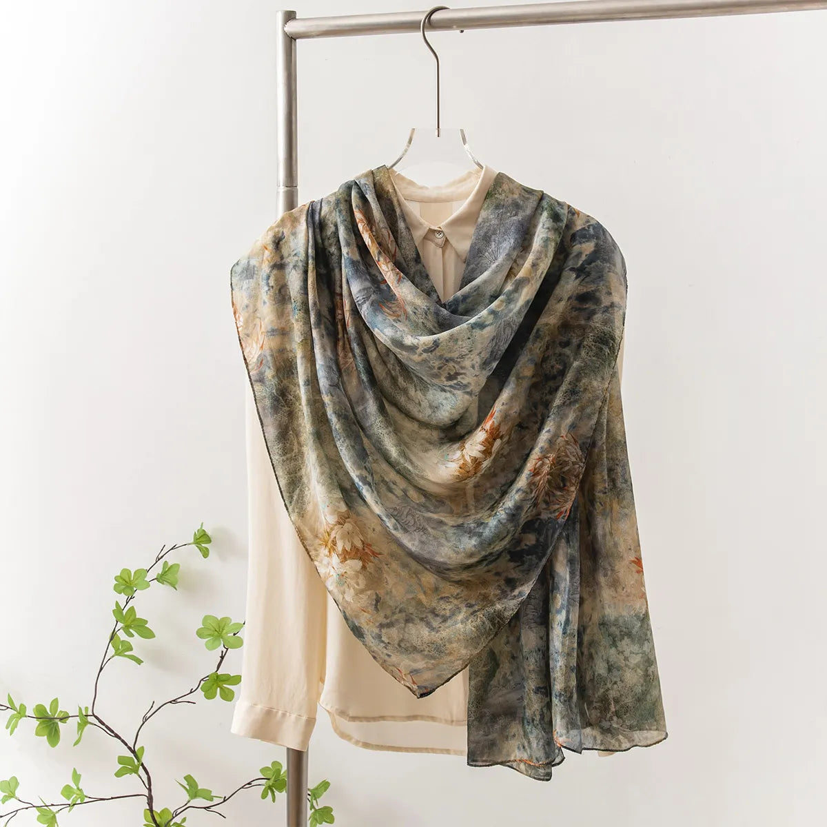 Dark green botanical silk shawl on blouse