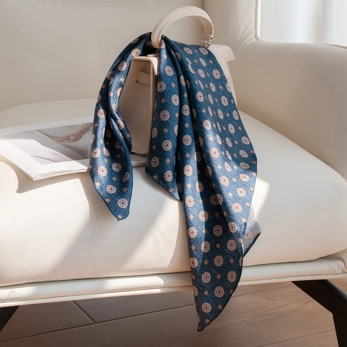Deep blue dot Silk Square Scarf draped on bag