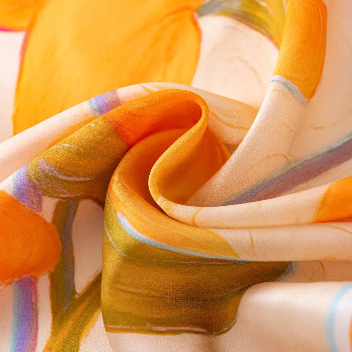 Draped peach silk scarf with orange abstract shapes