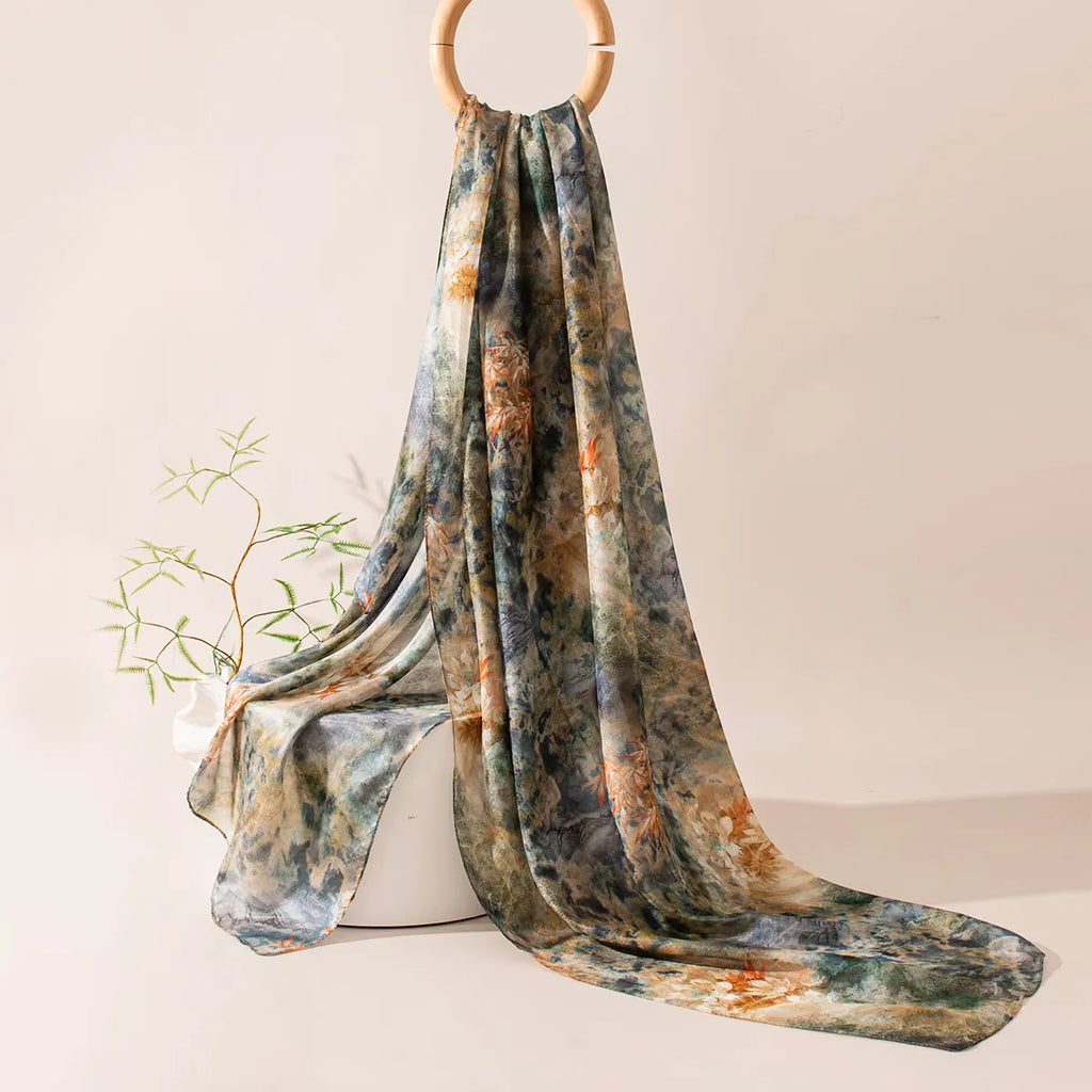 Emerald botanical haze silk scarf hanging display