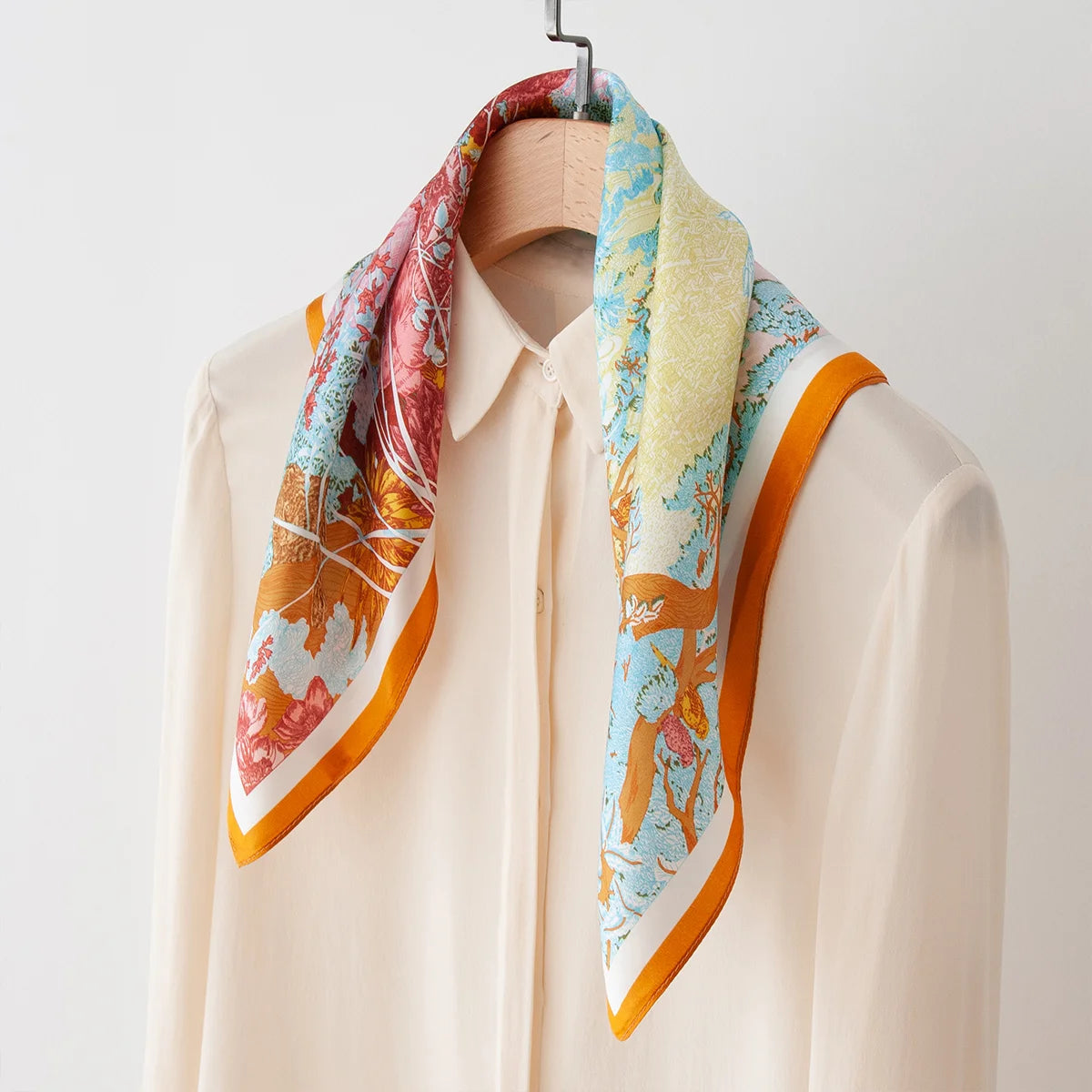 Enchanted garden Silk Square Scarf styled on blouse
