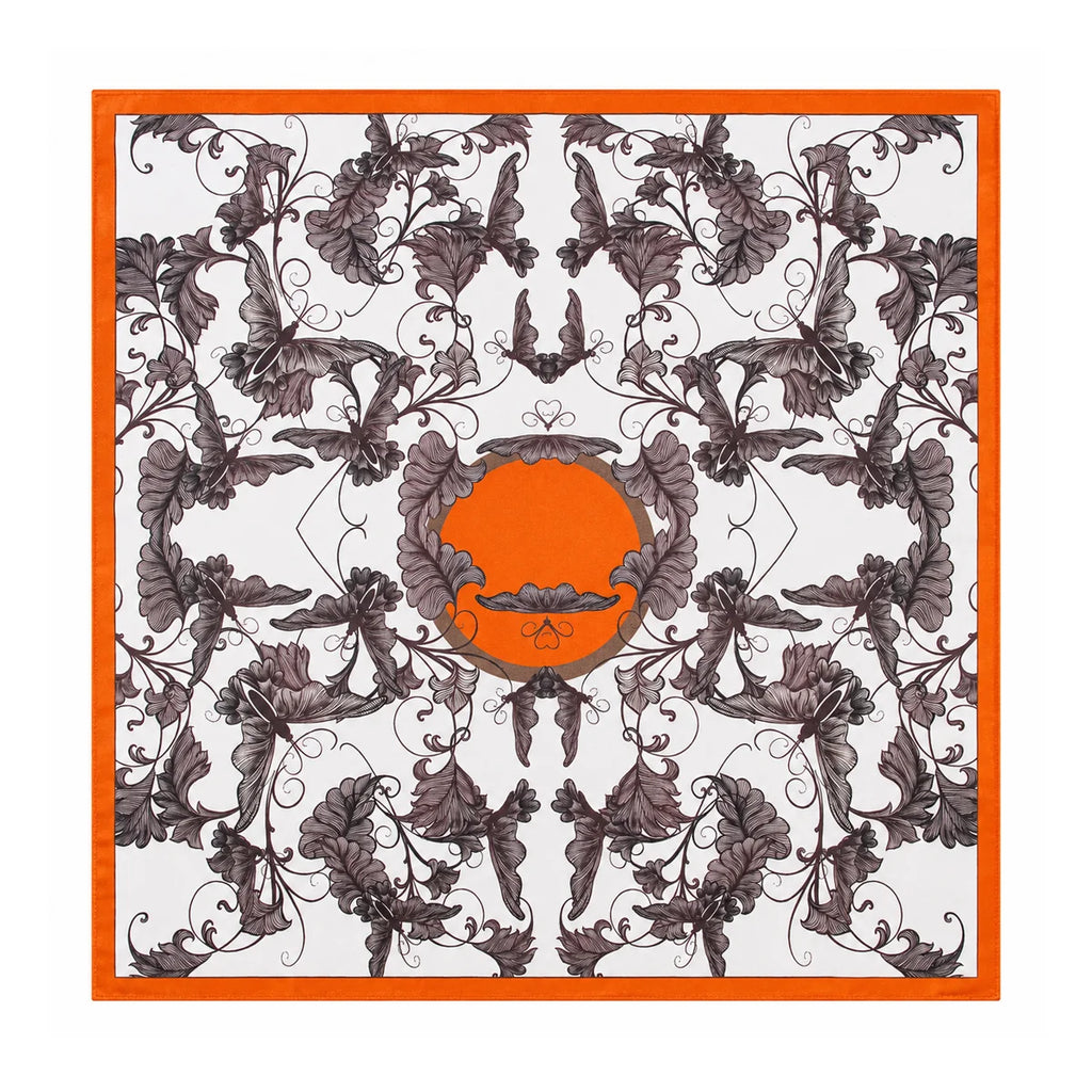 Flat-lay silk scarf with orange border and butterfly pattern
