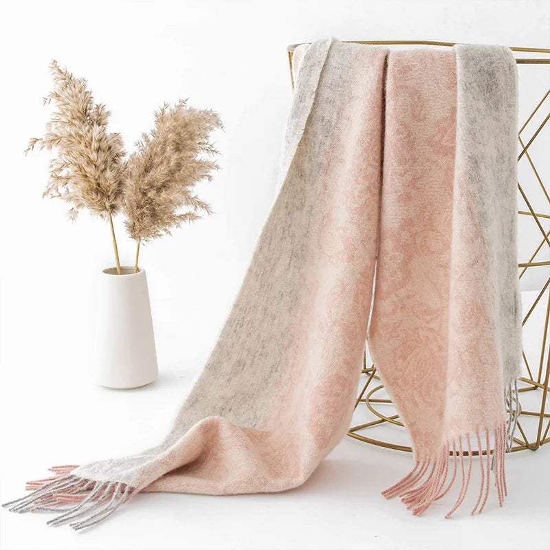 Floral wool scarf draped beside a vase of dried grasses