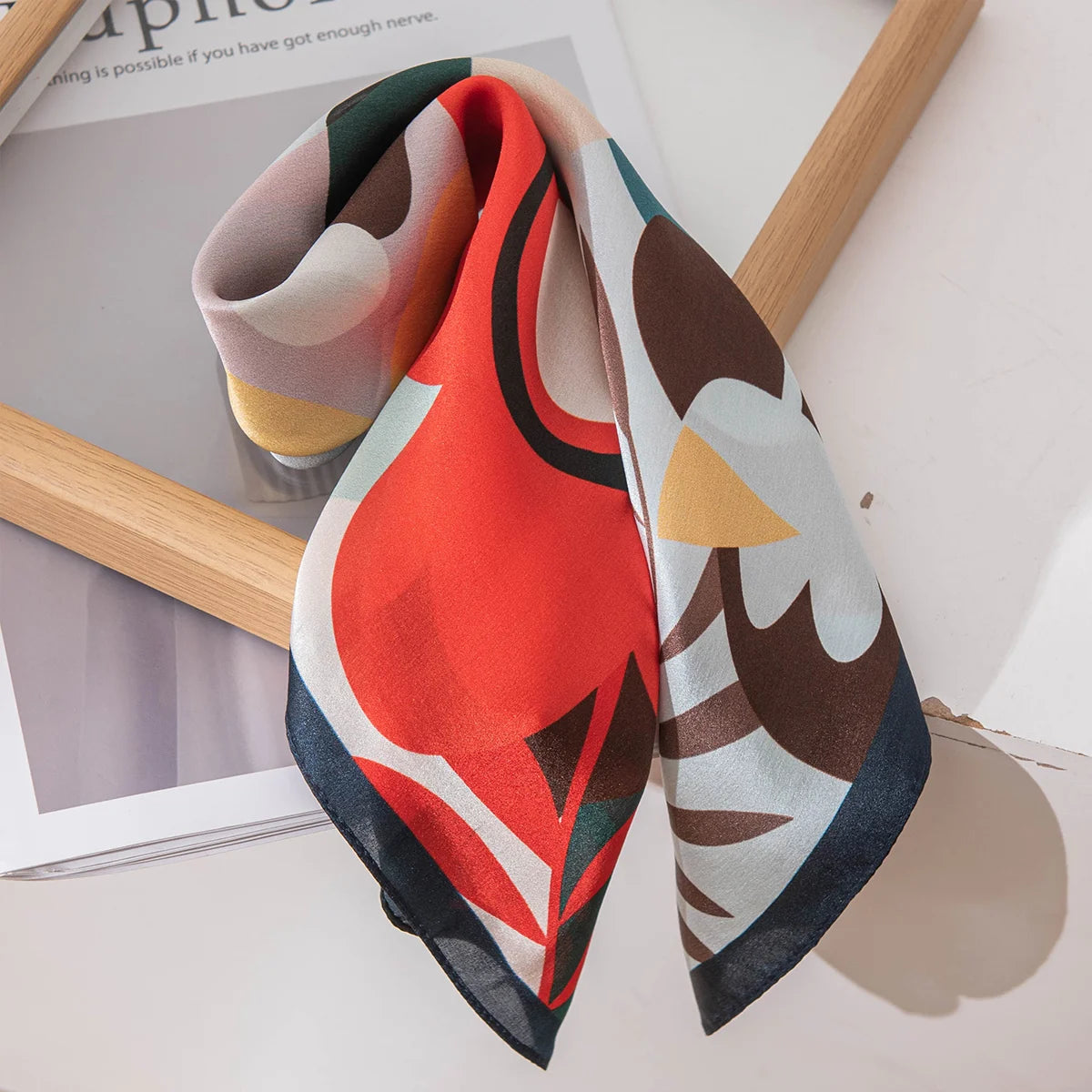 Folded abstract floral Silk Square Scarf tabletop display