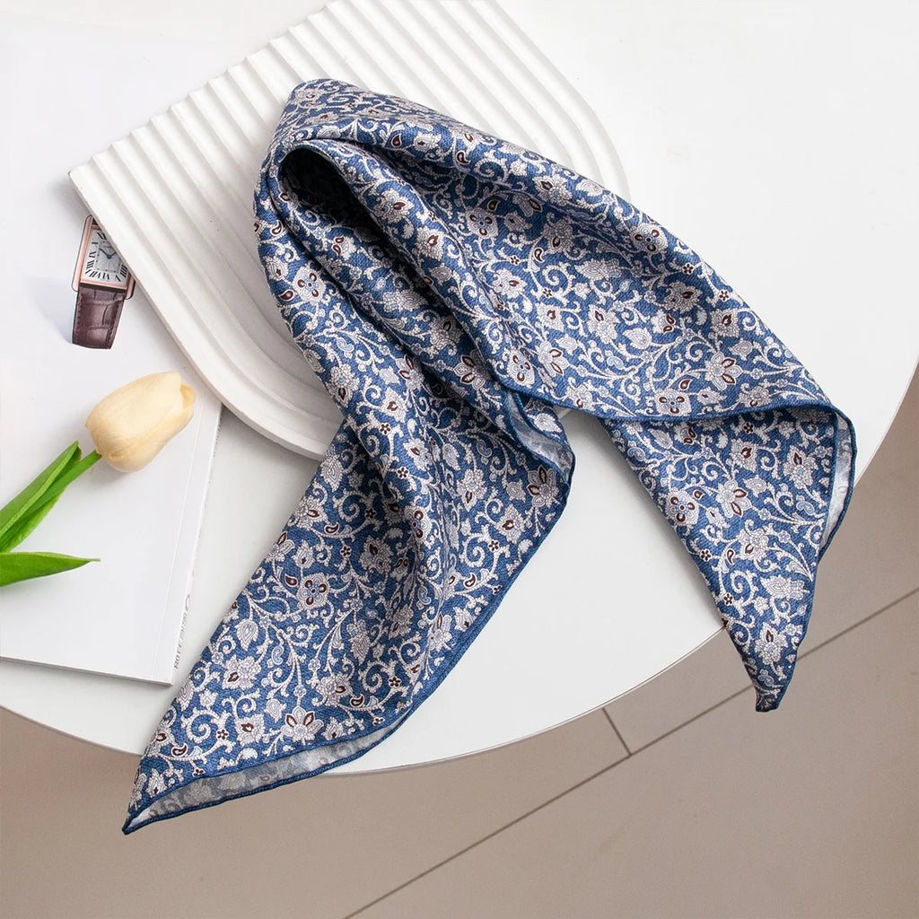 Folded blue ditsy floral Silk Square Scarf tabletop display
