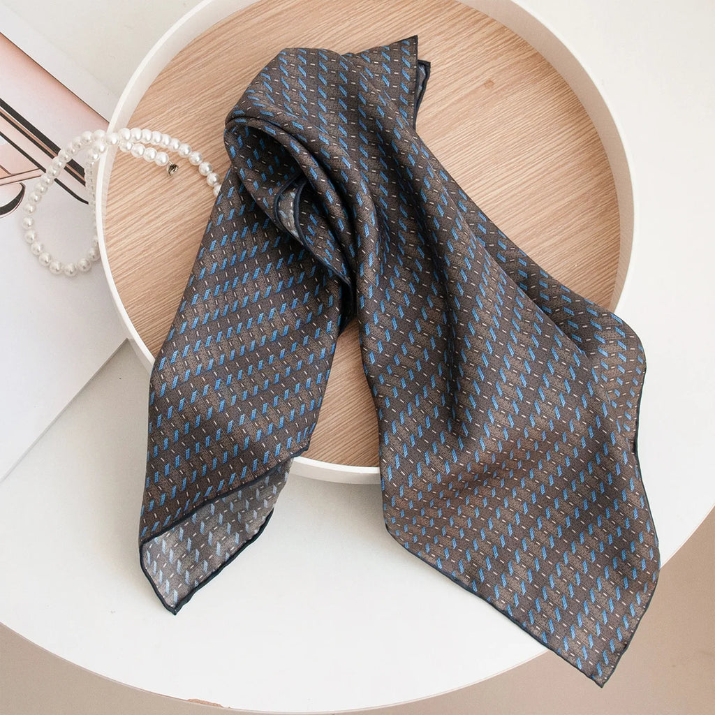 Folded blue stripe Silk Square Scarf tabletop display