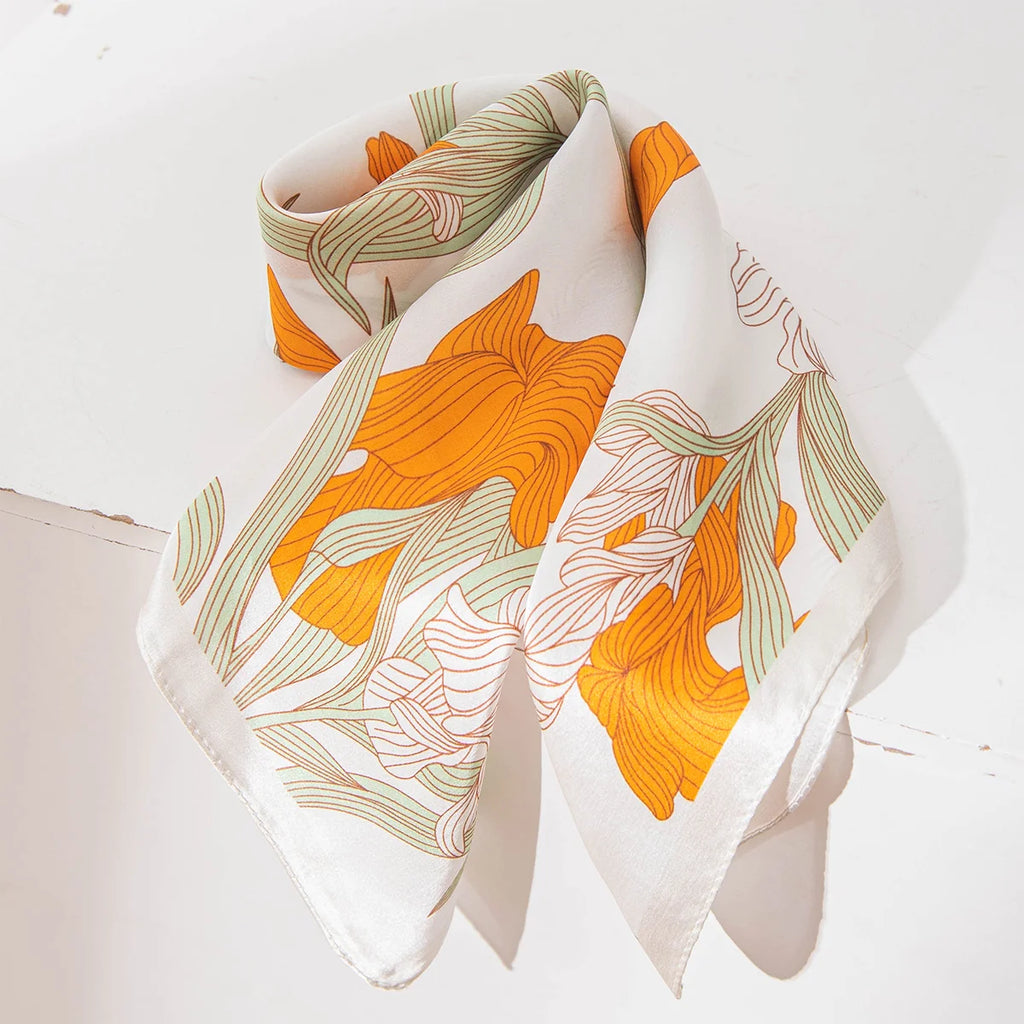 Folded botanical Silk Square Scarf tabletop display
