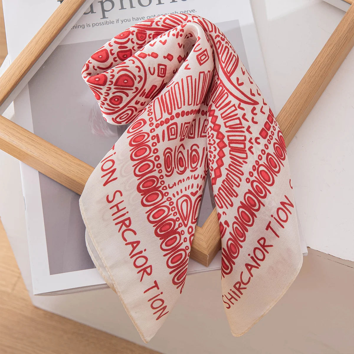Folded red elephant Silk Square Scarf tabletop display