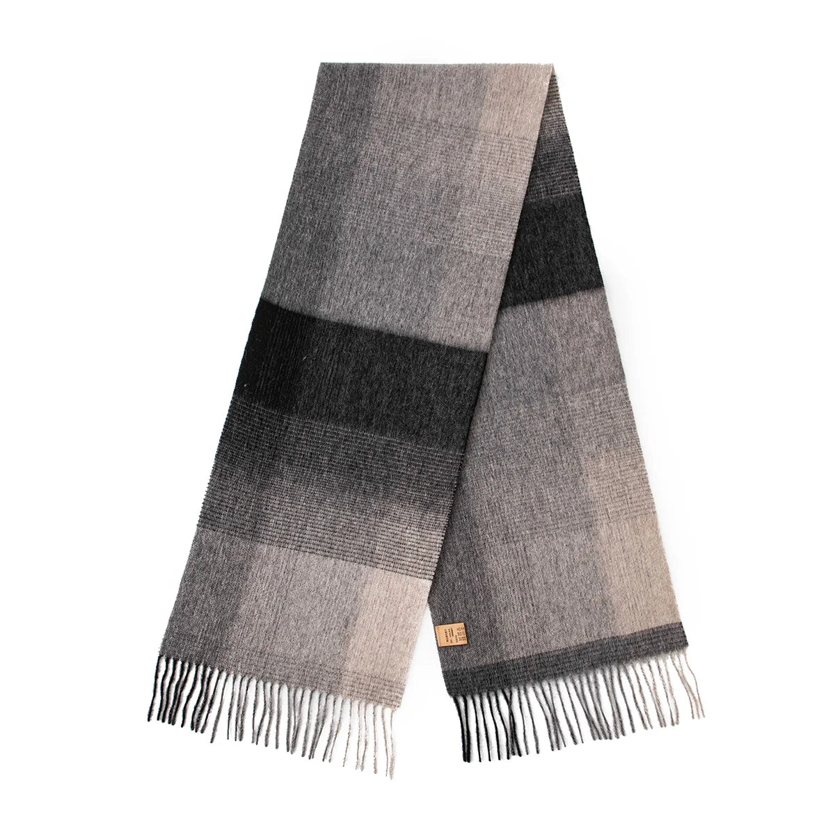 Gray black tonal check wool scarf showing contrasting fringed ends