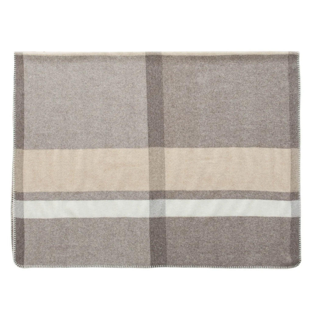 Gray checked cashmere wrap displaying cream bands and stitching