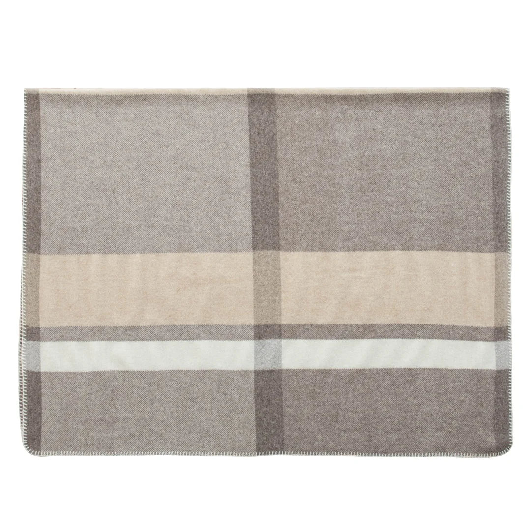 Gray checked cashmere wrap displaying cream bands and stitching