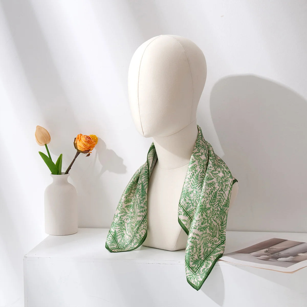 Green botanical Silk Square Scarf on display mannequin