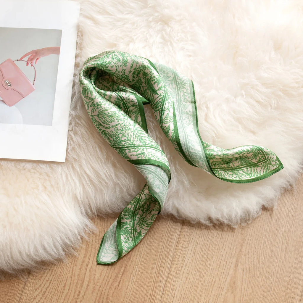Green botanical Silk Square Scarf styled on faux fur