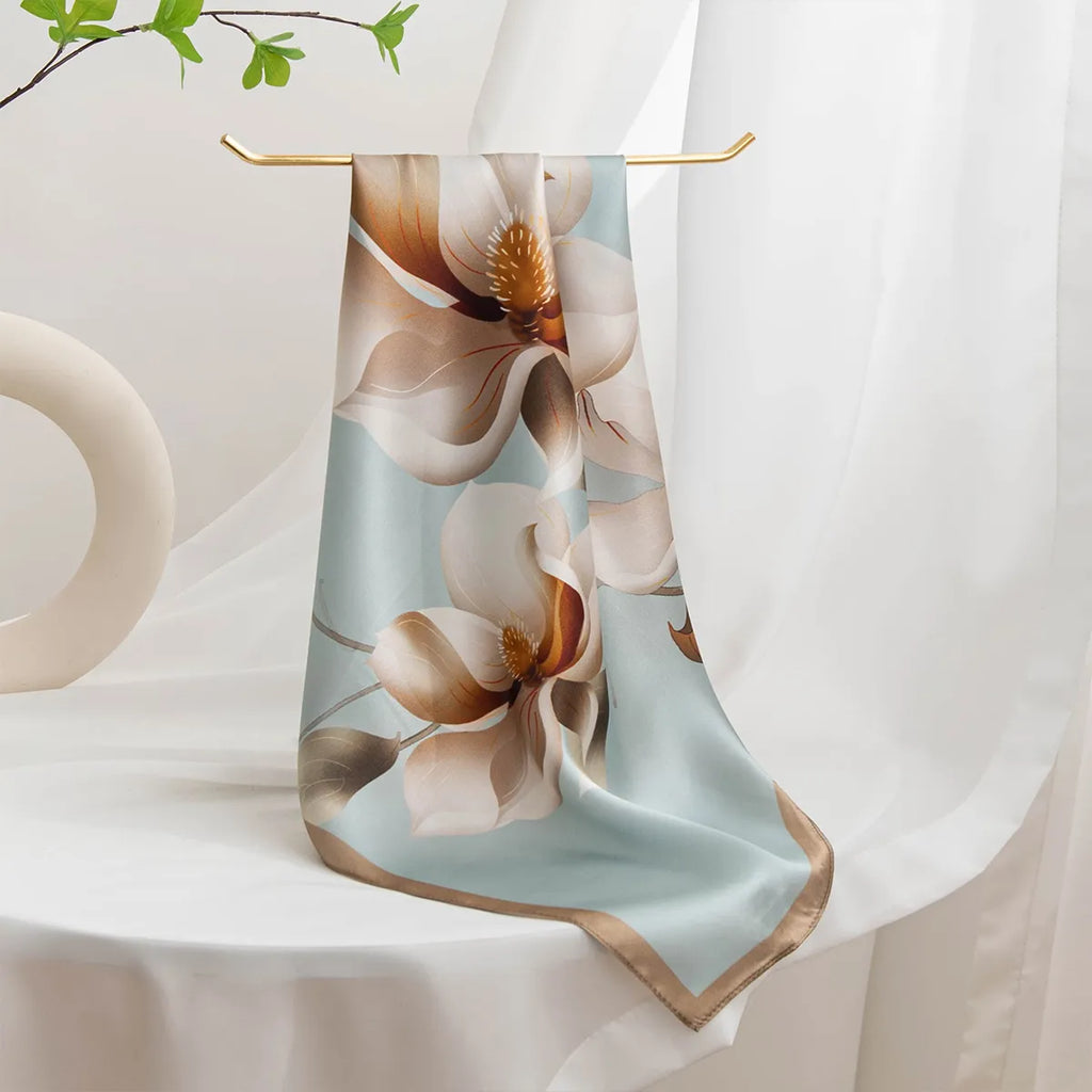 Hanging light blue silk scarf with large magnolia blooms