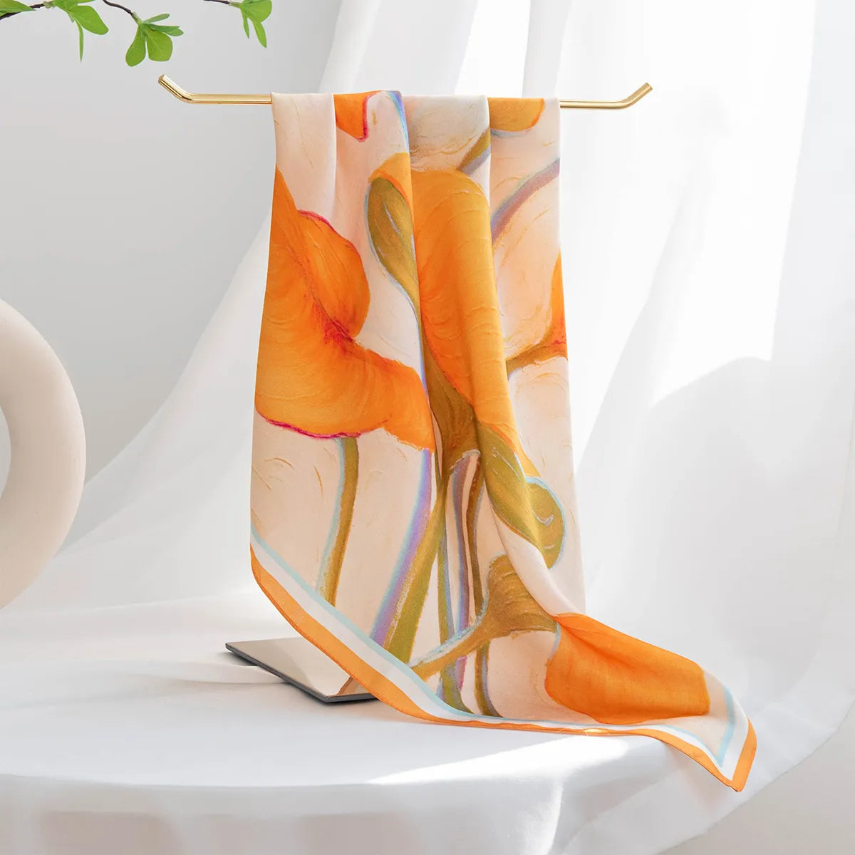 Hanging orange floral silk scarf with light blue border