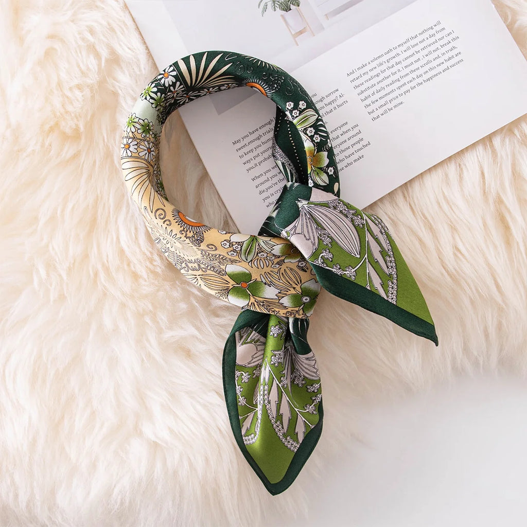 Knotted botanical silk scarf on book