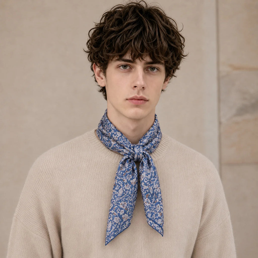 Man wearing blue ditsy floral Silk Square Scarf necktie