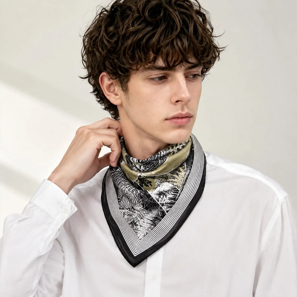 Man wearing botanical Silk Square Scarf bandana style