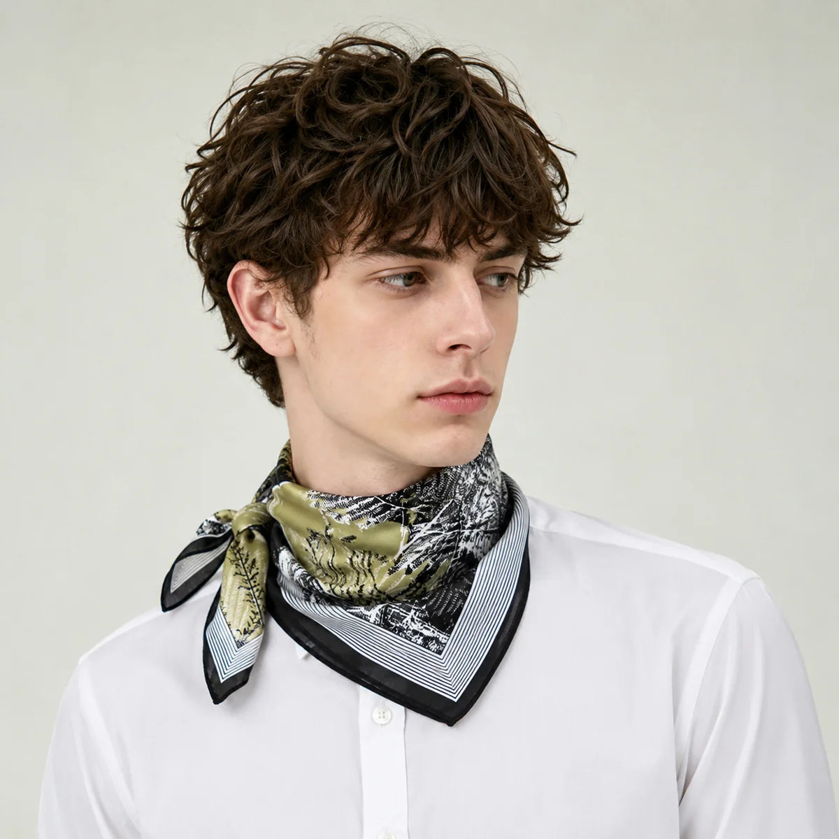 Man wearing botanical Silk Square Scarf neck tie