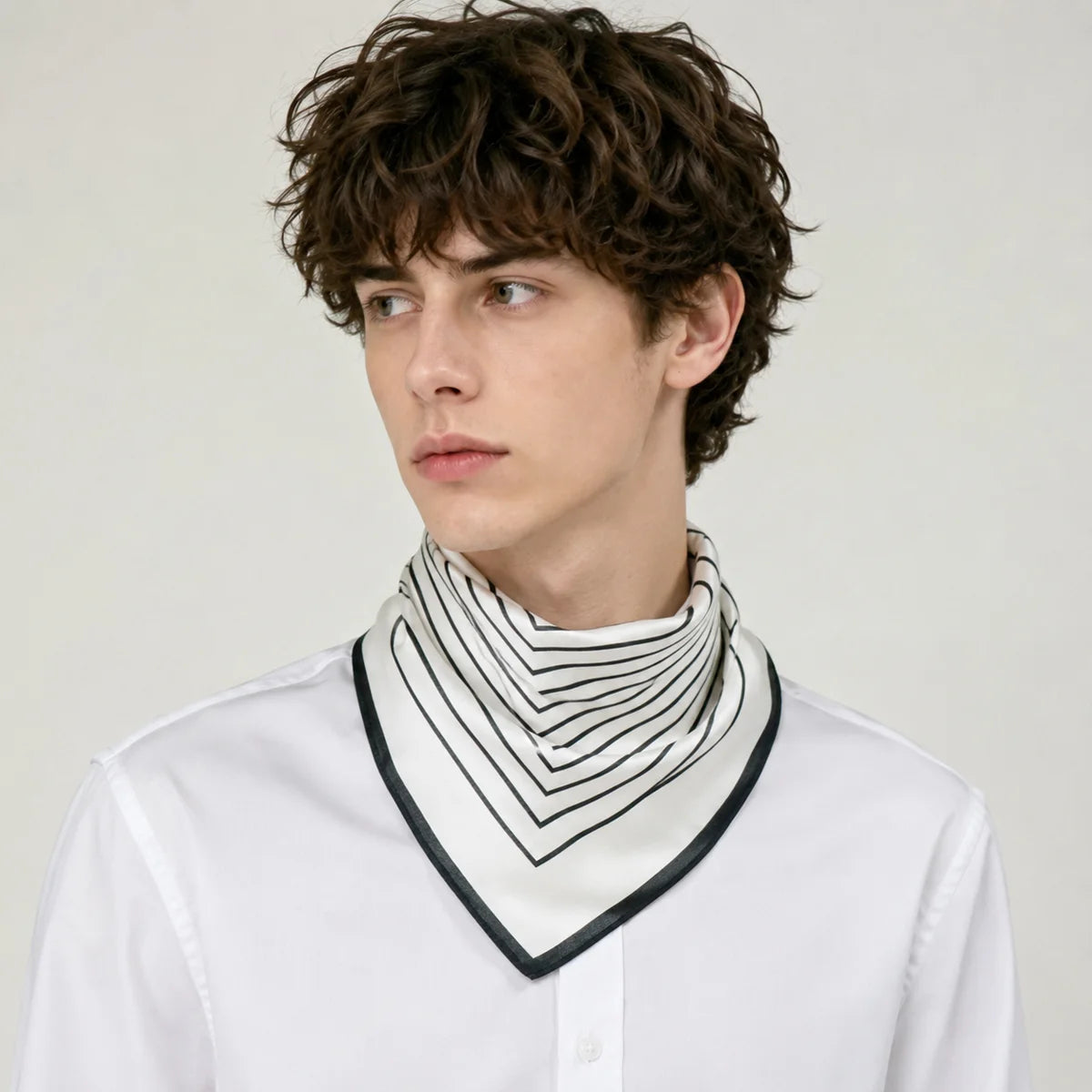 Man wearing concentric square Silk Square Scarf bandana style