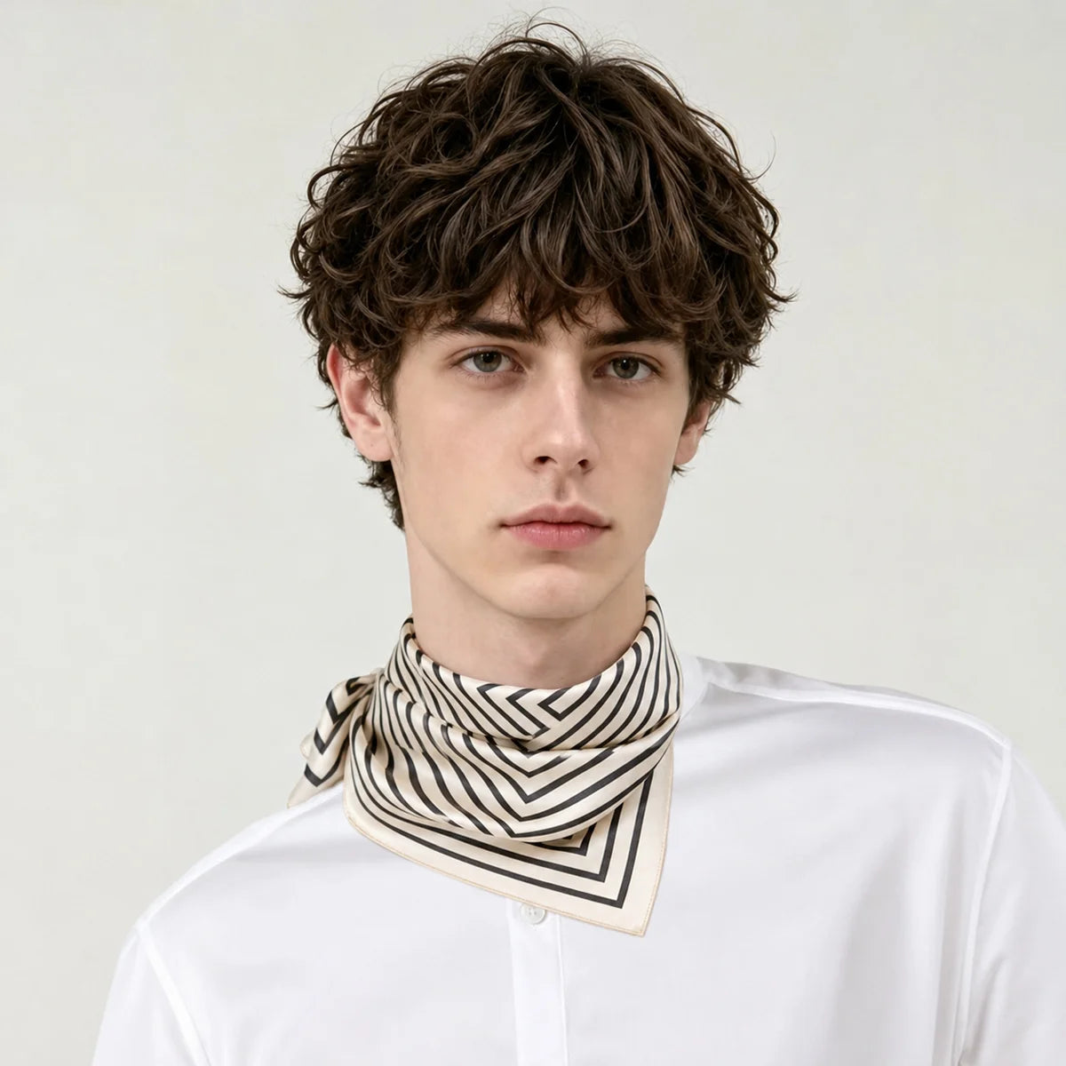 Man wearing concentric square Silk Square Scarf necktie