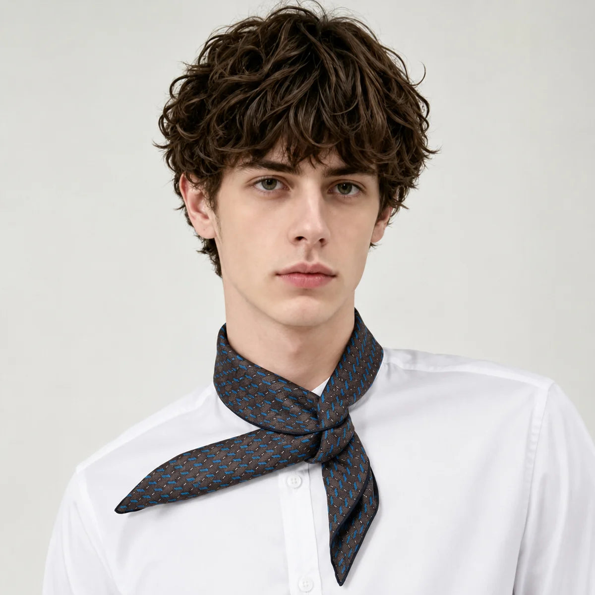 Man wearing dark striped Silk Square Scarf necktie
