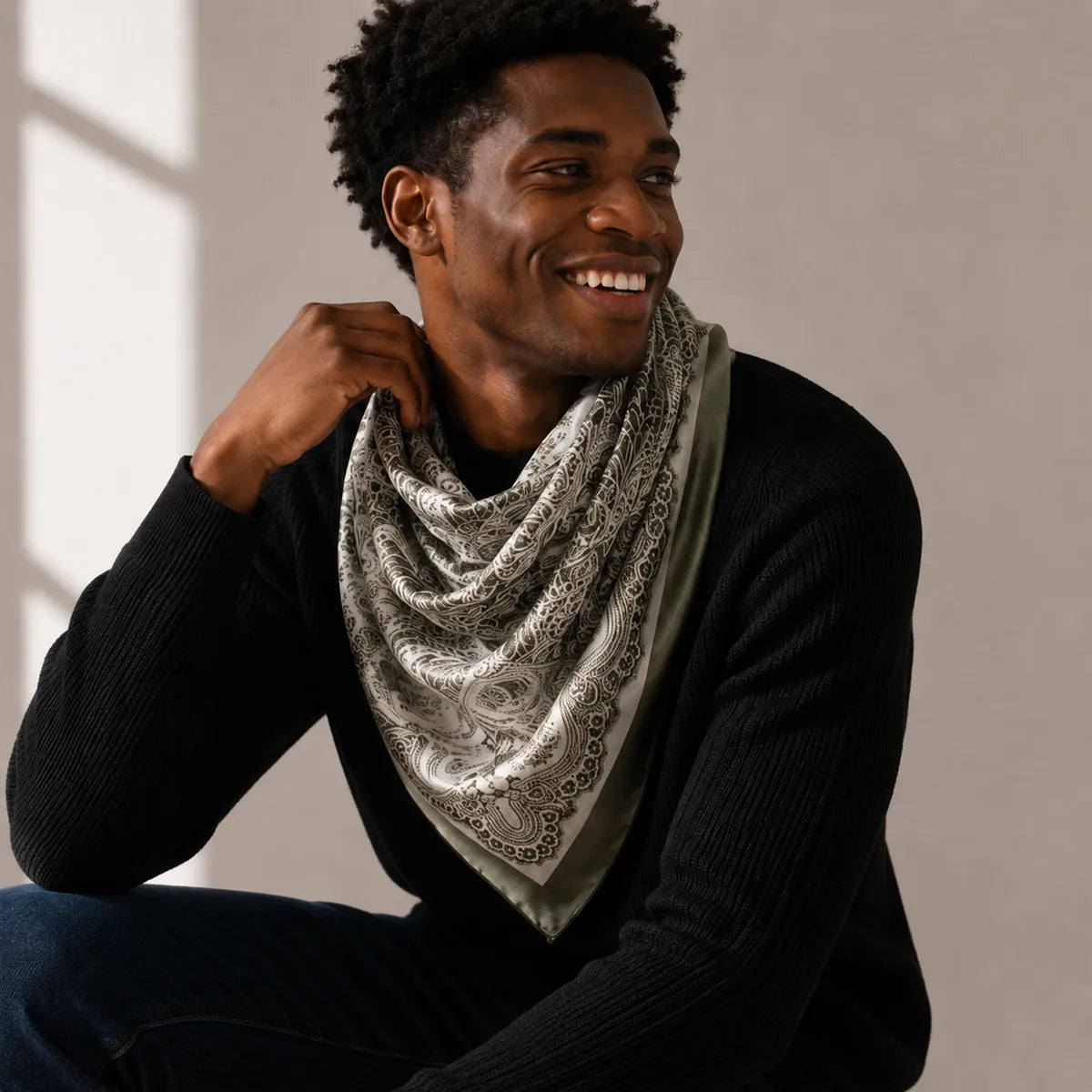 Man wearing olive botanical silk shawl indoors