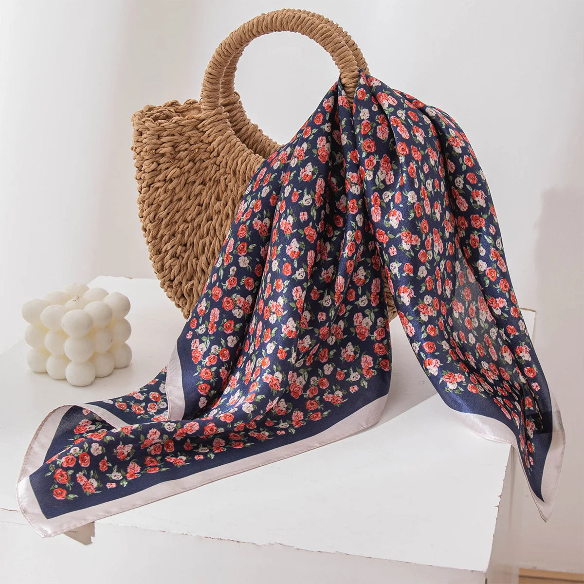 Navy rose Silk Square Scarf draped on bag